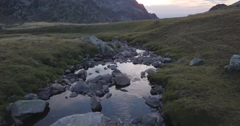 Drone Shot Fallowing River In The Mountain Sunset Stock Footage 161711307