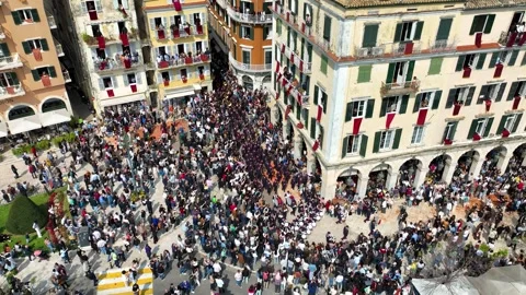 Drone shot of the famous Philharmonics marching band during Easter celebrations Stock Footage 333819687