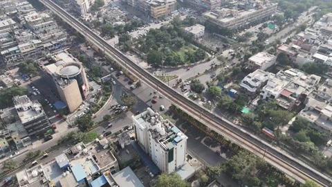Drone shot featuring Noida’s rapidly developing sectors, multi-lane highways Video stock 322509138