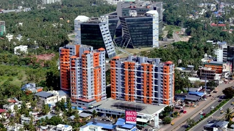 Drone shot featuring Technopark Phase III with distinctive contemporary office 動画素材 345111075