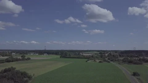 Drone shot of fields and forest Stock Footage 235032310