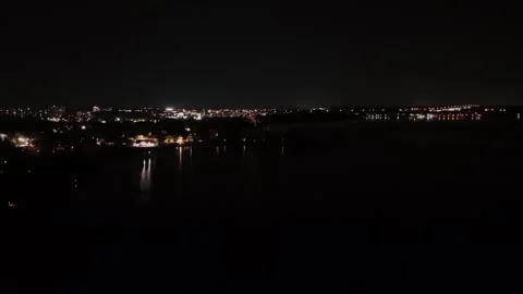 Drone shot of fireworks shot off on a beach at night Stock Footage 336205178