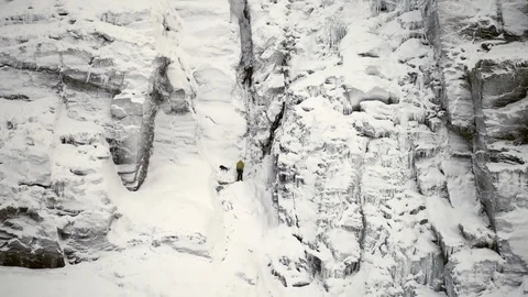Drone shot, flight towards 2 winter climbers. 4K Stock Footage 90088193