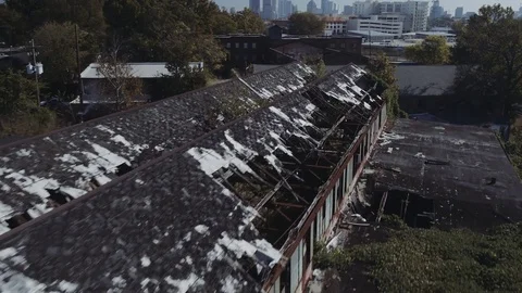 Drone Shot fly over of Decaying Building to Atlanta Skyline Pan Stock Footage 82451680