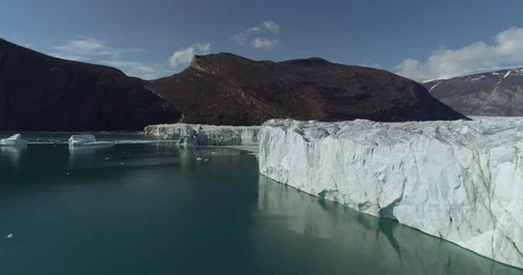 Drone Shot Flying Along The Face Of A Retreating Glacier Towards Iceberg Stock-Footage 96043635