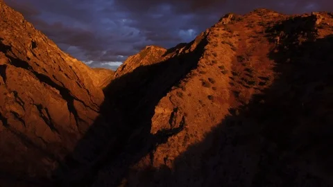 Drone shot flying backwards away from mountains Stock-Footage 127463351