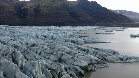 Drone shot, flying backwards over edge of glacier Stock Footage 112580920