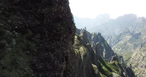 Drone shot flying close nect to Avatar mountains Madeira over steep valley Stock Footage 140623305