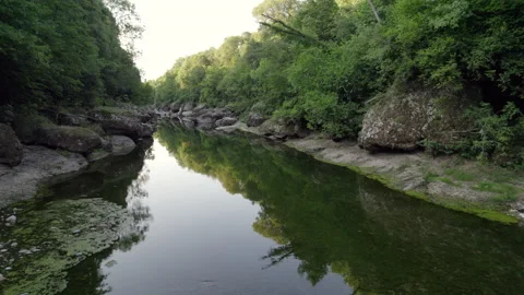 Drone Shot Flying Low Over River Reflections Stock Footage 201109722