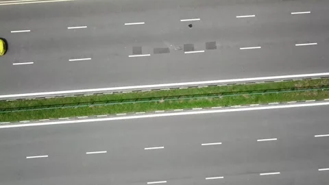 Drone shot flying over a bridge with cars driving by (Singapore) Stock Footage 329052047