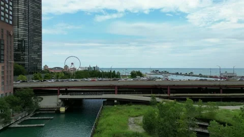 Drone shot flying over Chicago downtown near the river and bridges of the Stock Footage 228831301