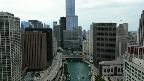 Drone shot flying over Chicago downtown near the river and bridges of the Stock Footage 228831403