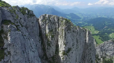 Drone shot flying over mountaintops 4K ULTRA HD Stock Footage