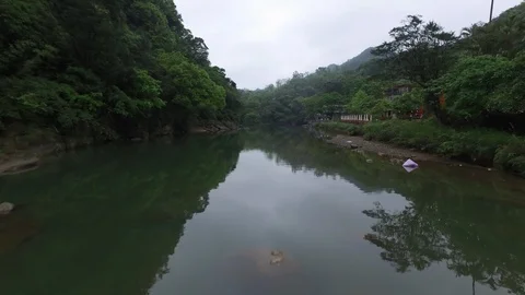 Drone shot flying over river and waterfall cliff Stock Footage 85813973