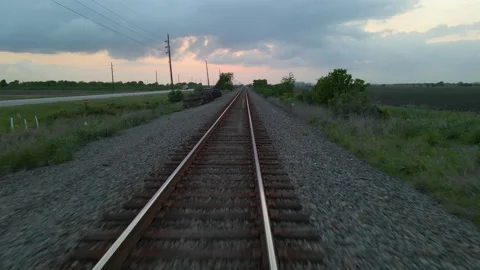 Drone Shot Flying Quickly Over Empty Railroad Track Before Lifting Up And Stock Footage 188436357