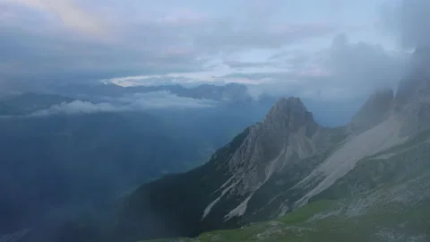 Drone Shot flying through Clouds and Fog in alpine Wilderness high Mountains Stock Footage 220503249