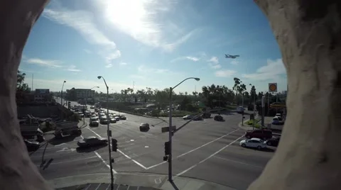 Drone shot flying through Iconic Randy's Donuts sign in Los Angeles Видео 50145061