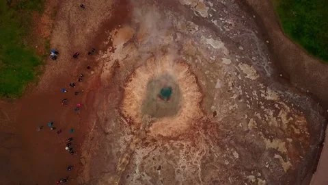 Drone shot flying up water explosion in Geysir geyser seen from sky Iceland, 2K Stock Footage 148749280