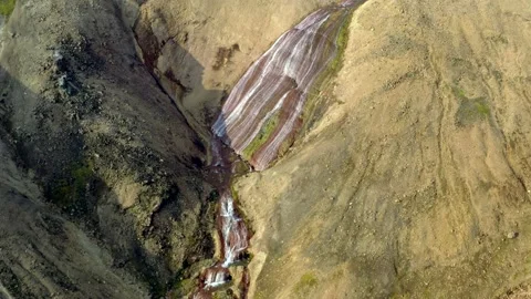 Drone shot flying up from a waterfall. Stock Footage 132340494