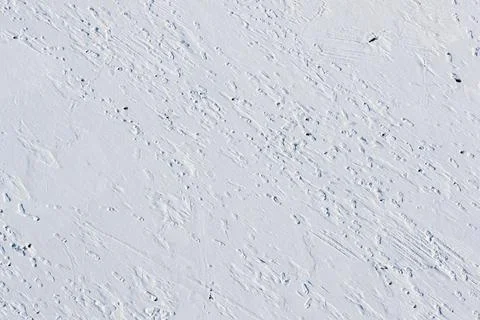 Drone shot of footprints in the snow texture Stock Photos