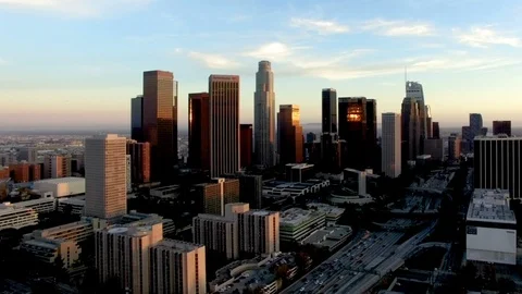 Drone shot of freeway traffic passing through downtown Los Angeles Stock Footage 89819943