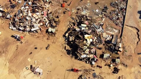 Drone Shot of Gadani Ship Breaking Yard Beach, Rusty Scrapyard and Ocean Stock Footage 341124973