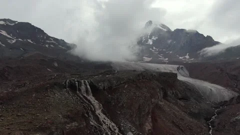 Drone shot of the glacier waterfall. Mount Kazbek. Stepantsminda (Kazbegi). G Video stock 168224819