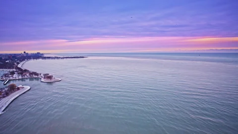 Drone shot gliding above Chicago’s Loop at daybreak in winter. Stock Footage 332254565
