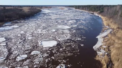 A drone shot going down the river together with huge ice pack blocks Stock Footage 149819204