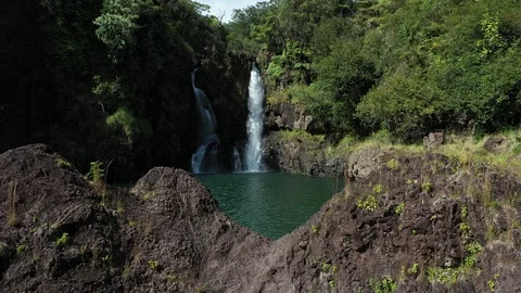Drone Shot going towards a big waterfall in Stock Footage 124441782