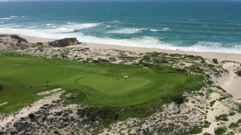 Drone shot of golf course green with ocean backdrop in Portugal Video stock 252467608