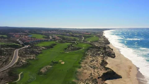 Drone shot of golf course with ocean backdrop in Portugal Video stock 252466208