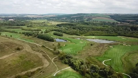 A drone shot of a golf field Stock Footage 115992312