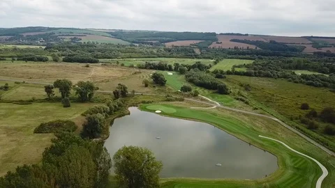 A drone shot of a golf field Stock Footage 115992316