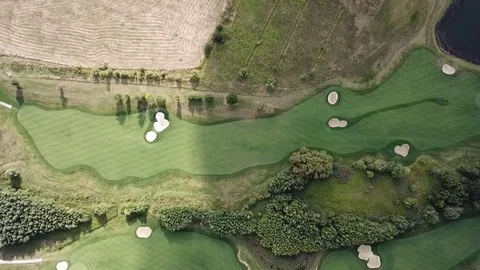 A drone shot of a golf field Stock-Footage 115993186