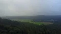 Drone shot gray clowdy foggy weather low mountain range valley landscape 4k or 4k+ Resolution