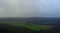 Drone shot gray clowdy foggy weather low mountain range valley meadows 4k or 4k+ Resolution
