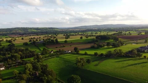 Drone shot green fields and nature in Shropshire countryside, England Stock Footage 260367472