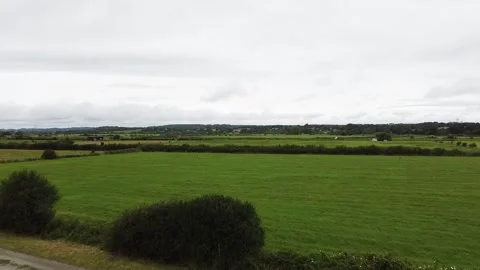 Drone shot grey cloudy sky and green fields, Rieux France 스톡 동영상 171623289