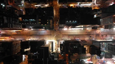 Drone shot of grid structure in Hong Kong commercial district at night Stock-Footage 109467582