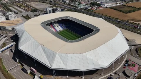Drone shot of Groupama Stadium (Parc Olympique Lyonnais) in Lyon, France Video stock 293127780