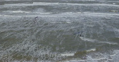 Drone shot of a guy kiting in Amsterdam, Netherlands, left Stock Footage 71836137
