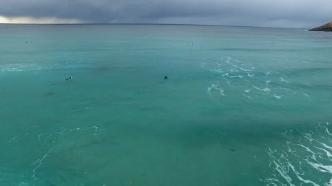 Drone shot a guy surf in Lofoten, Norway, back Stockbeeldmateriaal 71834646