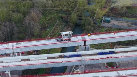 Drone shot of high-speed rail construction infrastructure showing a heavy-load Stock Footage 340268090