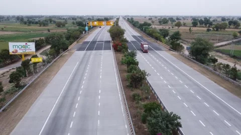 Drone shot of high speed world class transit corridor Yamuna Expressway Stock Footage 242403950