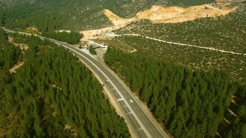 Drone Shot of Highway Between Forest and Quarry Stock Footage 146175851
