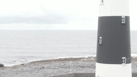 Drone shot of Historic Lighthouse on Aran Island, Ireland Stock Footage 224818272