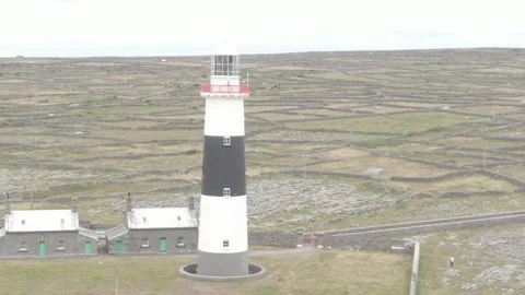 Drone shot of Historic Lighthouse on Aran Island, Ireland Stock Footage 224819486
