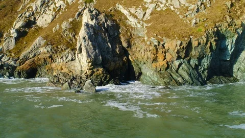 A Drone Shot Of Howth Rock, County Dublin, Ireland From the Sea. Vídeo Stock 99284135
