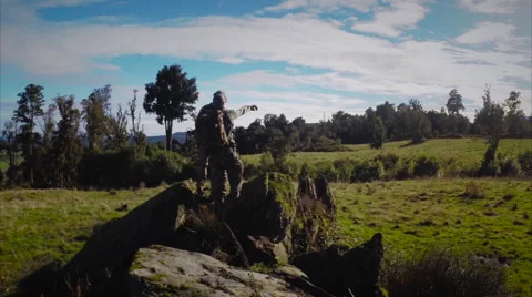 Drone shot of hunters in clearing. Stock Footage 50039397